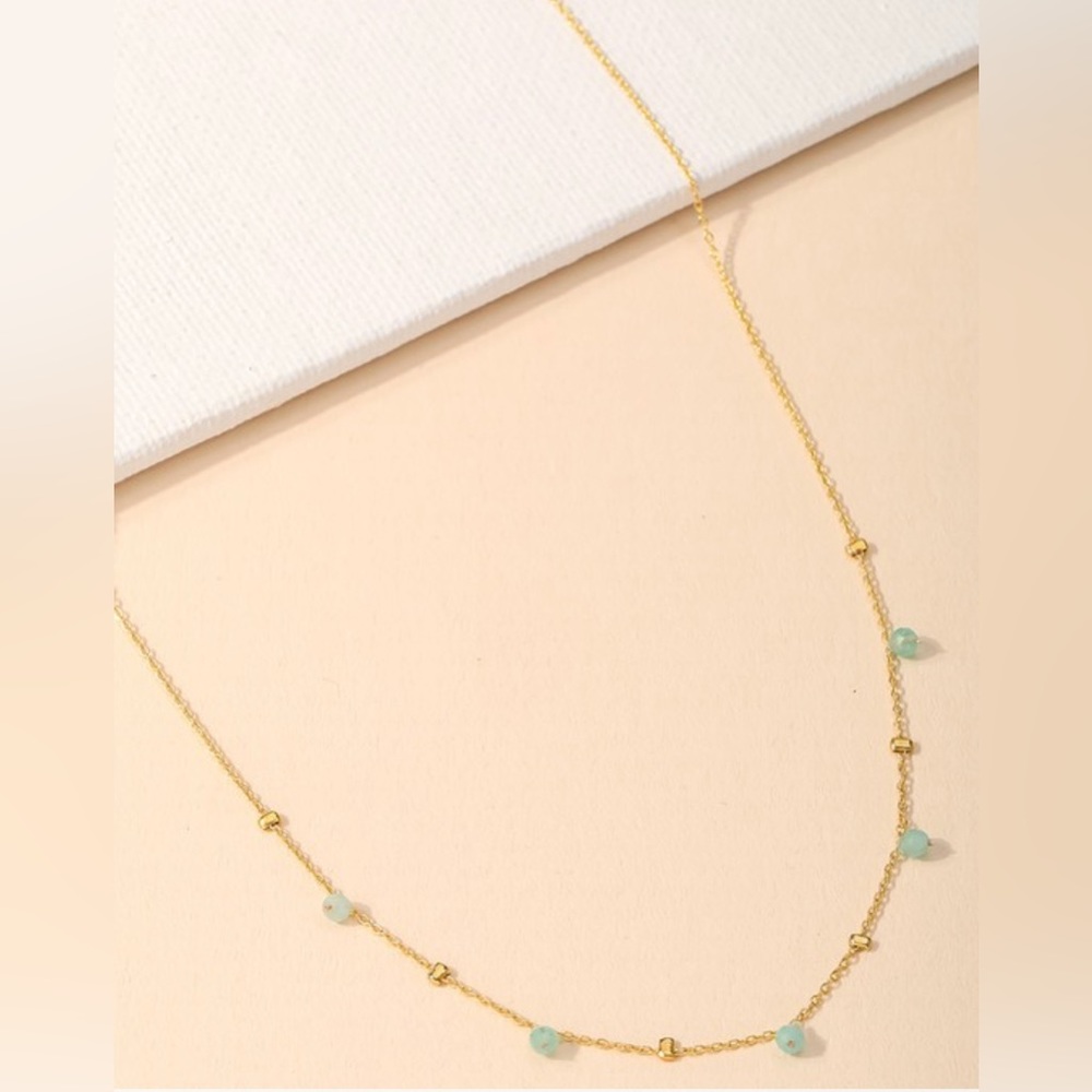 Dainty gold chain and bead necklace